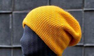 The Slouch beanie in mustard wool.